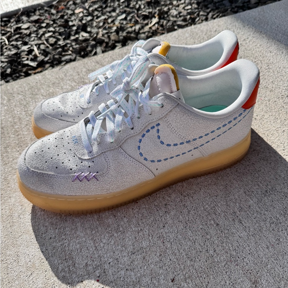 Nike White and Blue Sneakers with Classic Silhouette